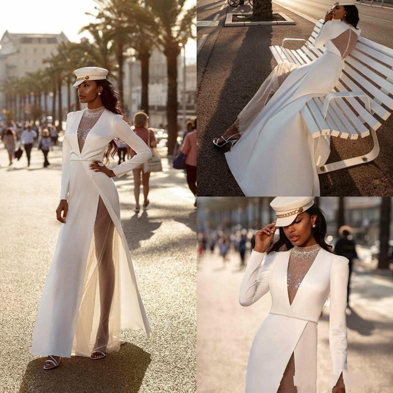 Designer Long Sleeves Wedding Dresses High Neck Sexy Illusion Bodice Beaded Crystals Tulle Side Slit Floor Length Custom Made Beach Bridal Gown Vestid