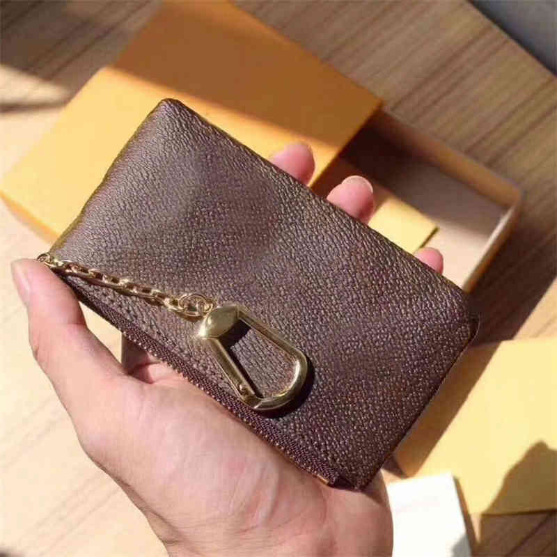 High quality Luxury design Portable KEY P0UCH wallet classic Man/women Coin Purse Chain bag With dust bag and box, Black flowers
High quality Luxury design Portable KEY P0UCH wallet classic Man/women Coin Purse Chain bag With dust bag and box, Black flowers