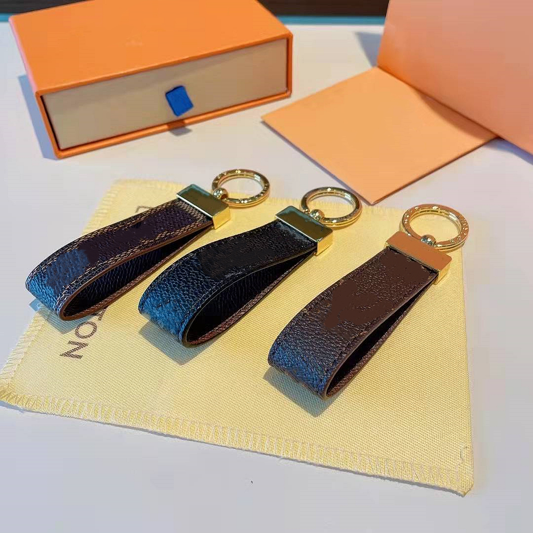 2022 Keychain Brand Designer Keychain Men's Luxury Car Keycring Ladies Fashion Hasp Keychains High Quality Leather Mens Womens Bag Pendant Accessories Multicolor
2022 Keychain Brand Designer Keychain Men's Luxury Car Keycring Ladies Fashion Hasp Keychains High Quality Leather Mens Womens Bag Pendant Accessories Multicolor