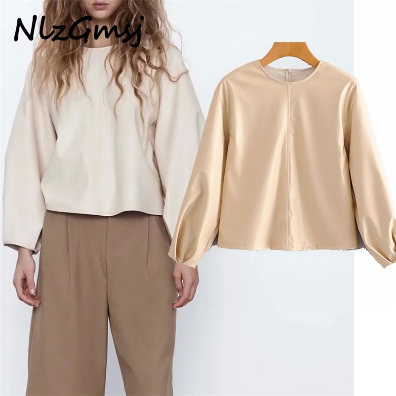 Women Fashion PU Faux Leather Loose Blouses Vintage Long Pleated Sleeve Back Zipper Female Shirts Blusas Chic Tops 210628, Khaki
Women Fashion PU Faux Leather Loose Blouses Vintage Long Pleated Sleeve Back Zipper Female Shirts Blusas Chic Tops 210628, Khaki