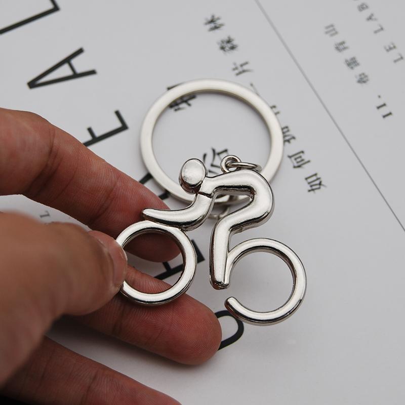 Keychains 2021 Metal Sporty Man Bicycle Figure Keychain Keyring Trinket Souvenirs Creative Key Chain For Cycling Lover Biker Accessories
Keychains 2021 Metal Sporty Man Bicycle Figure Keychain Keyring Trinket Souvenirs Creative Key Chain For Cycling Lover Biker Accessories