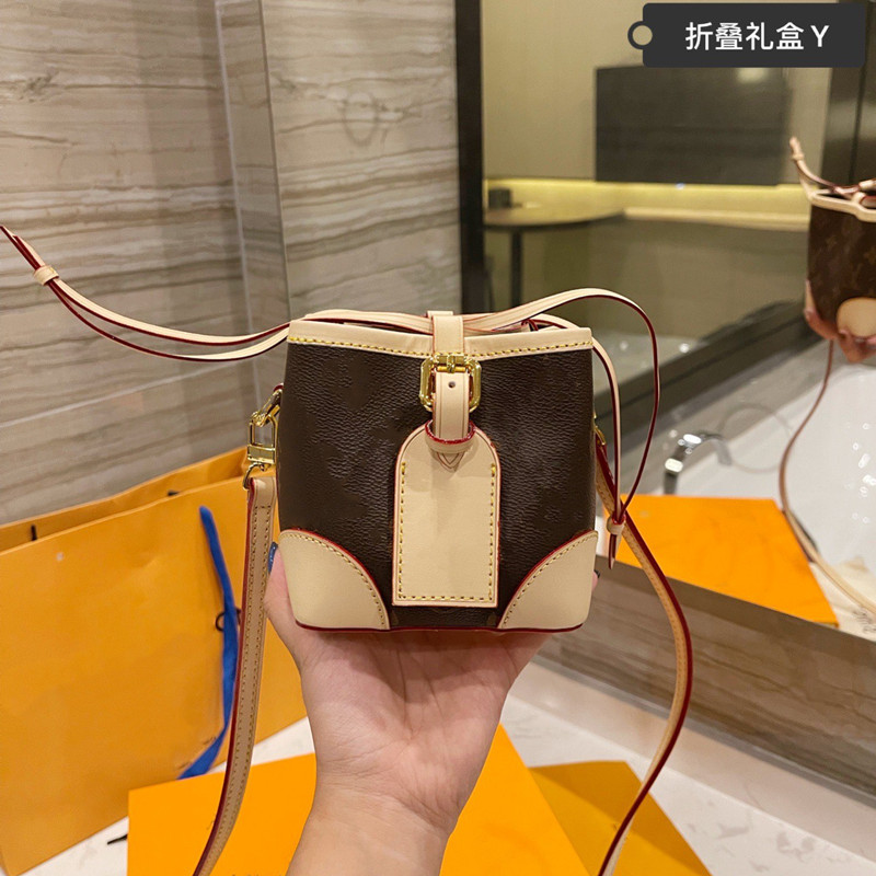 women shoulder bags 2021 summer and autumn new Fashion Ladies crossbody bag Retro small bucket-bags High-quality solid Leather Patchwork Letter Print size:12*11*11cm, Brown
women shoulder bags 2021 summer and autumn new Fashion Ladies crossbody bag Retro small bucket-bags High-quality solid Leather Patchwork Letter Print size:12*11*11cm, Brown