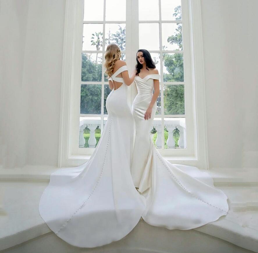 2021 Simple Satin Mermaid Wedding Dresses White Ivory Off The Shoulder Cross Back Long Covered Button Bridal Gowns Vestido de corte sirena
2021 Simple Satin Mermaid Wedding Dresses White Ivory Off The Shoulder Cross Back Long Covered Button Bridal Gowns Vestido de corte sirena