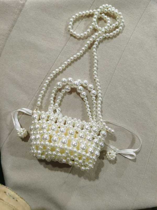 Dign French Bow Flower Chain Woven Beaded Pearl Mobile Phone Bag Crossbar, Finished basket bag
Dign French Bow Flower Chain Woven Beaded Pearl Mobile Phone Bag Crossbar, Finished basket bag