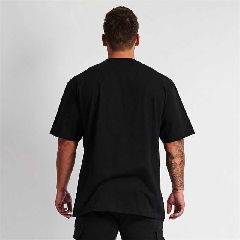 Gym Clothing Fitness Mens Oversized T Shirt Men Hip Hop Sportswear Loose Half Sleeve T-shirt Muscle Man Bodybuilding Tshirt 210629