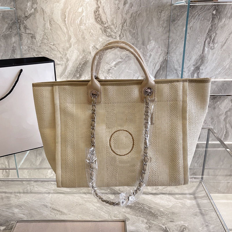2021ss Classic Style Canvas Stripes Beach Shopping Bag Womens Luxury Designer Deauville Chain Totes Double Shoulder Large Capacity Girls, Blue
2021ss Classic Style Canvas Stripes Beach Shopping Bag Womens Luxury Designer Deauville Chain Totes Double Shoulder Large Capacity Girls, Blue