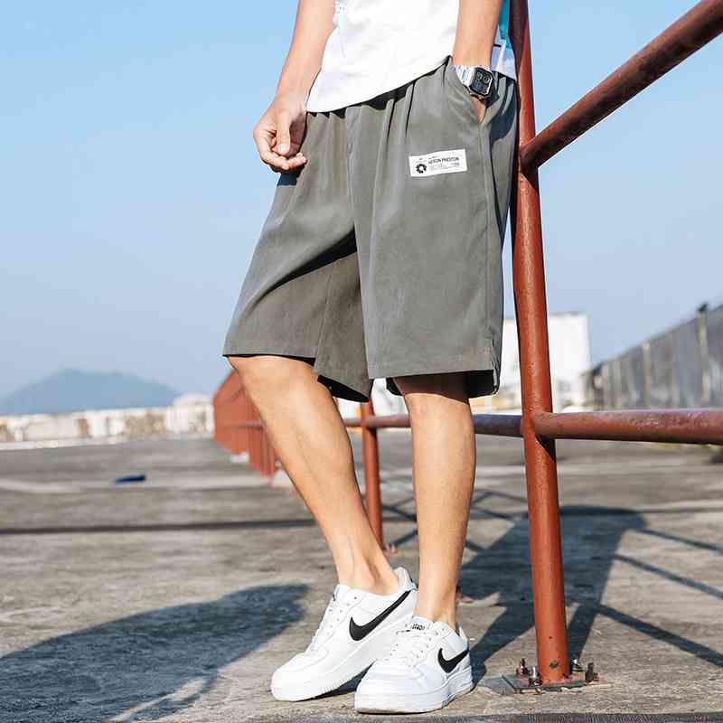 2020 summer new casual shorts fashion brand five piece men's loose sports pants, White;black
2020 summer new casual shorts fashion brand five piece men's loose sports pants, White;black
