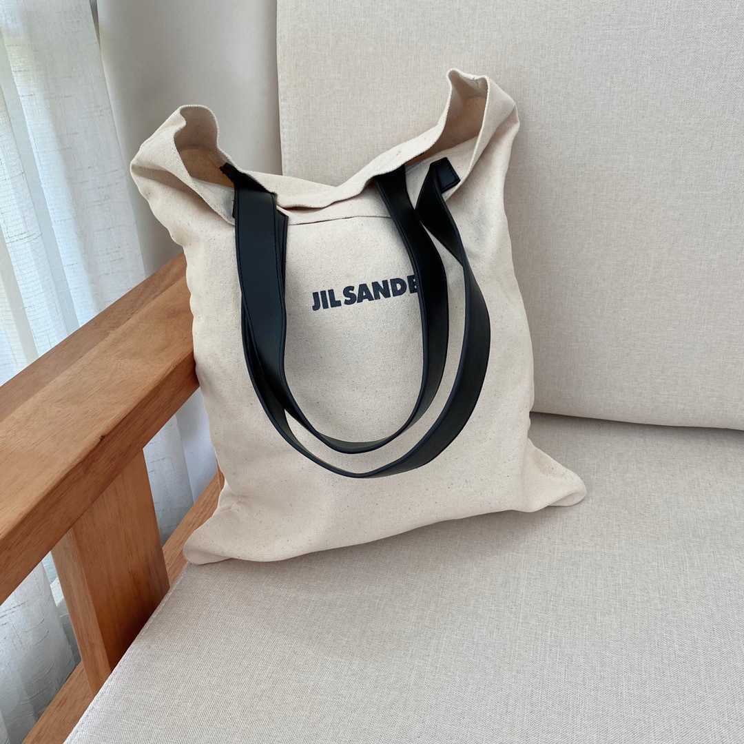 Jil sander large capacity single shoulder leisure fashion canvas bag wome Folding AN3Y
Jil sander large capacity single shoulder leisure fashion canvas bag wome Folding AN3Y