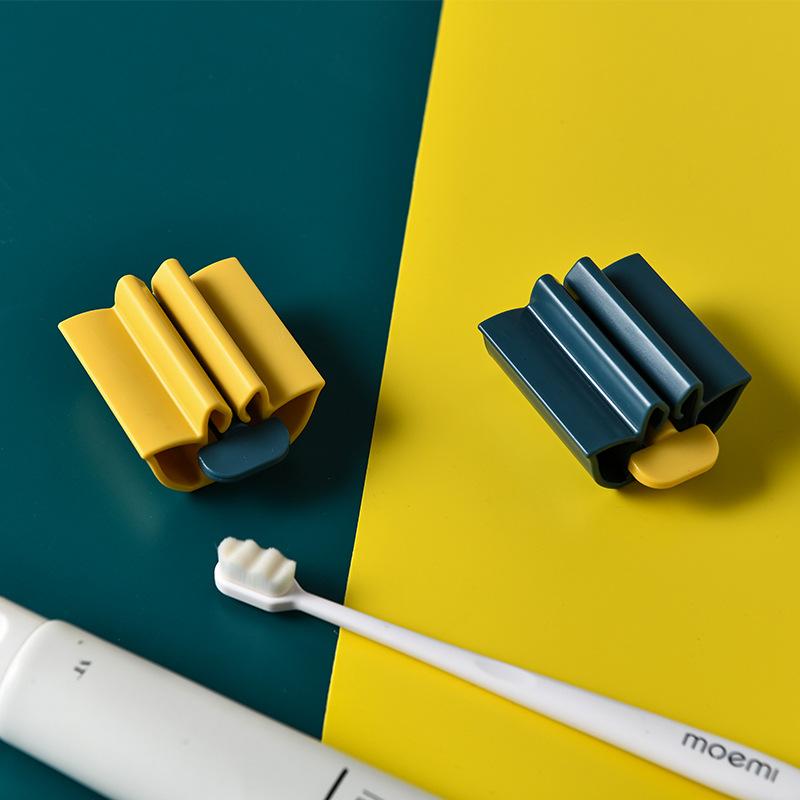 New Bathroom Accessories Toothpaste Squeezer Tooth Paste Dispenser Holder Tube Squeezer Facial Cleanser Press Rolling Holder for Kids