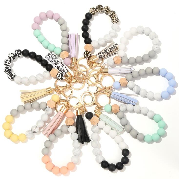 Wooden Tassel Bead String Bracelet Keychain Food Grade Silicone Beads Bracelets Women Girl Key Ring Wrist Strap 9 Colors, Silver
Wooden Tassel Bead String Bracelet Keychain Food Grade Silicone Beads Bracelets Women Girl Key Ring Wrist Strap 9 Colors, Silver