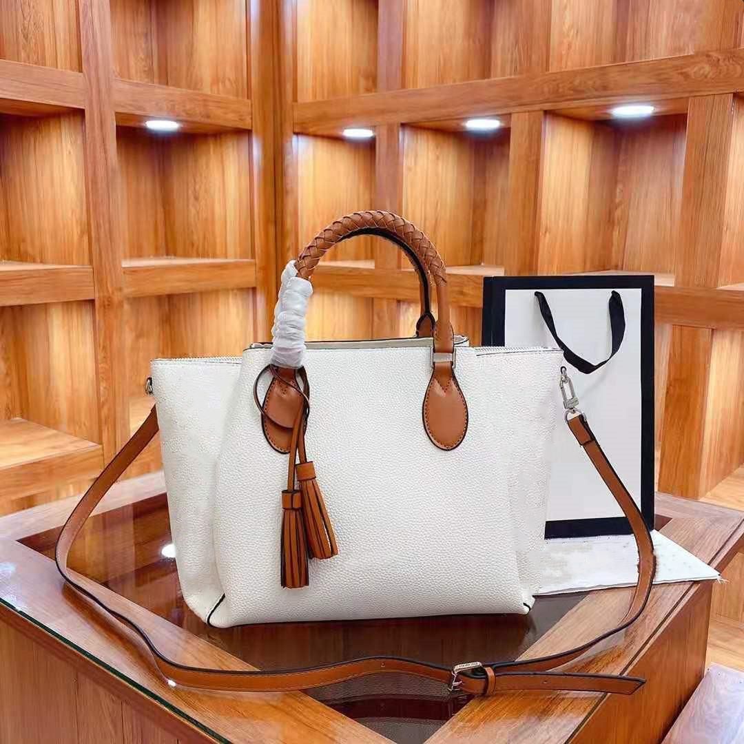 Large capacity preparation of hollow out double leather handbags ms tassel rote fashion leather shoulder bag, Customize
Large capacity preparation of hollow out double leather handbags ms tassel rote fashion leather shoulder bag, Customize