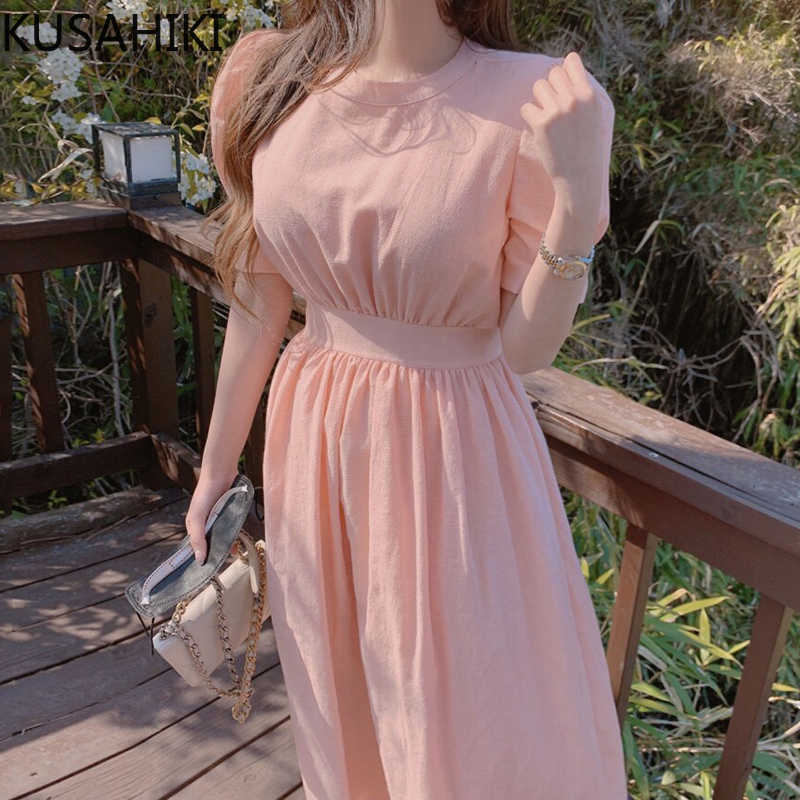 KUSAHIKI Korean Puff Sleeve O-neck Woman Dress Back Bow Tie Hollow-out Slim Waist Vestidos Femme Elegant Vestidos Femme 6H510 210602, Pink 
KUSAHIKI Korean Puff Sleeve O-neck Woman Dress Back Bow Tie Hollow-out Slim Waist Vestidos Femme Elegant Vestidos Femme 6H510 210602, Pink