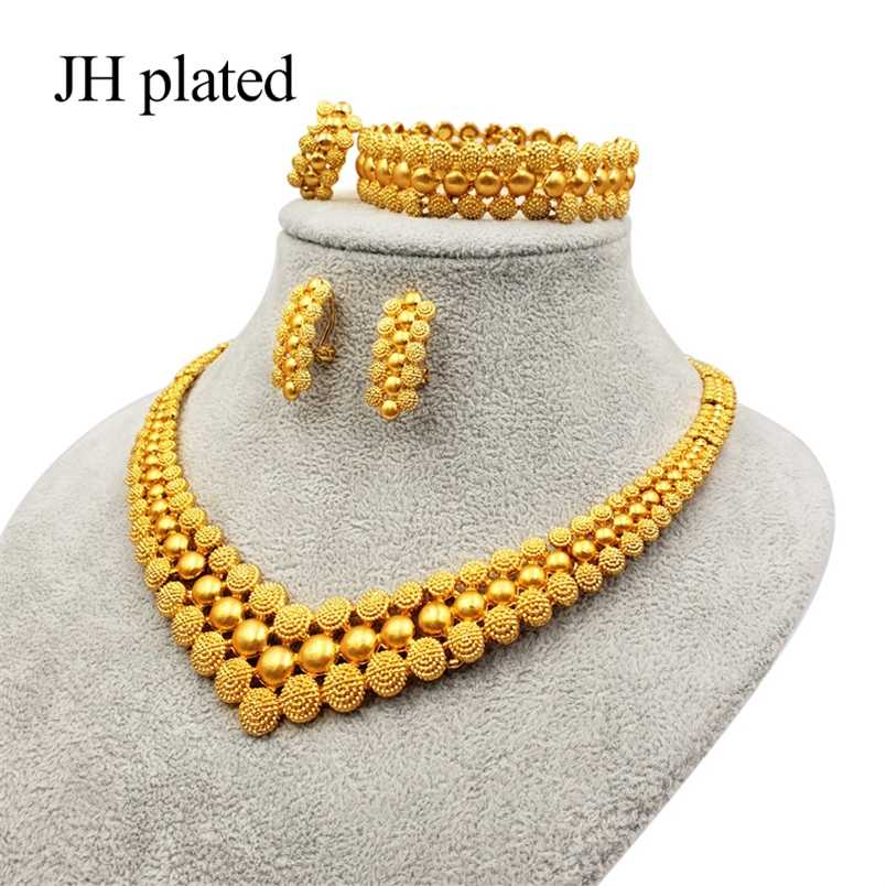 Nigeria Dubai Gold color jewelry sets African bridal wedding gifts party for women Bracelet Necklace earrings ring set collares 220105
Nigeria Dubai Gold color jewelry sets African bridal wedding gifts party for women Bracelet Necklace earrings ring set collares 220105