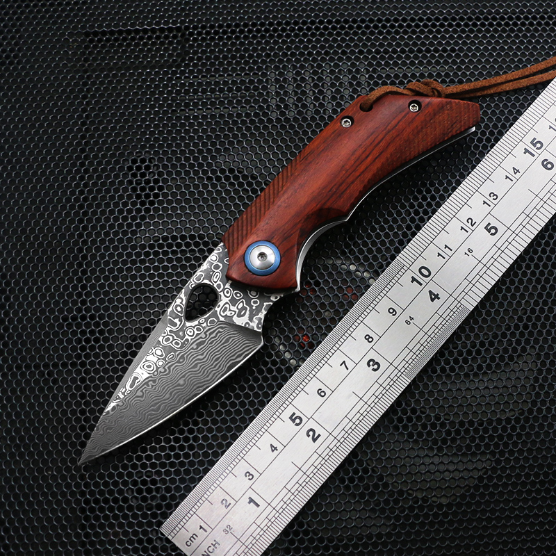 Mini Damascus high hardness folding knife Red acid branch wood handle EDC outdoor cutter adventure hunting knife
Mini Damascus high hardness folding knife Red acid branch wood handle EDC outdoor cutter adventure hunting knife