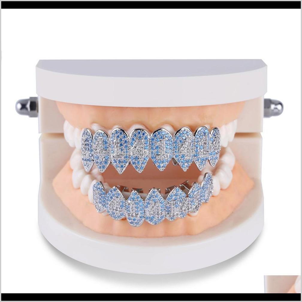 Grillz, Dental Sier Color Iced Out 1414 Gold Grillz Crystal Aessories Top Bottom Grills Teeth Body Jewelry Hip Hop Bling Cubic Zircon Drop D
Grillz, Dental Sier Color Iced Out 1414 Gold Grillz Crystal Aessories Top Bottom Grills Teeth Body Jewelry Hip Hop Bling Cubic Zircon Drop D