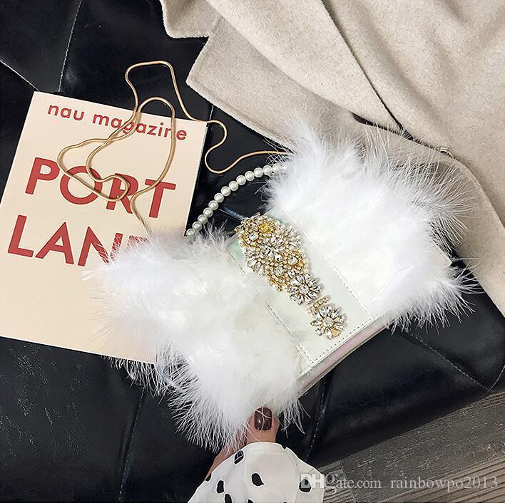 Factory wholesale women handbag new hand sewn Turkey hair chain bag sweet lovely diamond fur bag pearl decoration diamond Dinner Bag, Black;red
Factory wholesale women handbag new hand sewn Turkey hair chain bag sweet lovely diamond fur bag pearl decoration diamond Dinner Bag, Black;red