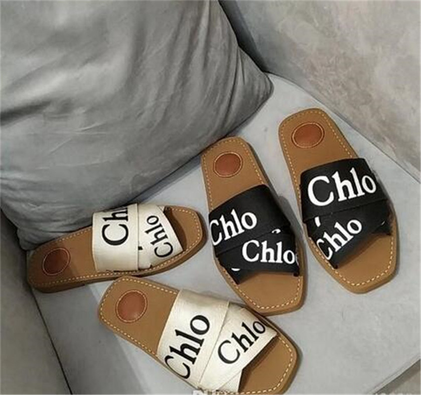 06 2021 Branded Women Woody Mules Flat Slipper Fashion Girl Lettering Fabric Outdoor Leather Sole Slide Sandal for Summer Day Size 35-42, Black
06 2021 Branded Women Woody Mules Flat Slipper Fashion Girl Lettering Fabric Outdoor Leather Sole Slide Sandal for Summer Day Size 35-42, Black