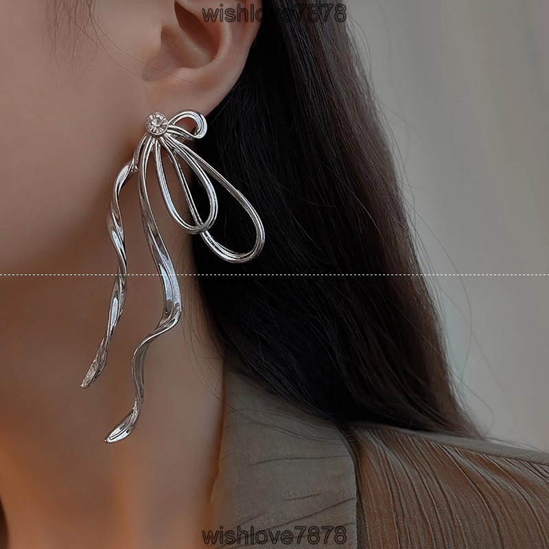 2021 New Korean Silver Color Metal Bing Long Bow Earrings for Women Girls Elegant Bowknot Hanging Drop Dangle Earrings
2021 New Korean Silver Color Metal Bing Long Bow Earrings for Women Girls Elegant Bowknot Hanging Drop Dangle Earrings