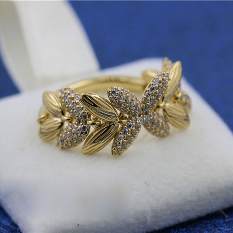 18CT Gold Plated Shine Circle of Seeds Ring with CZ Stones Fit Pandora Style Jewelry Engagement Wedding Lovers Fashion Ring
18CT Gold Plated Shine Circle of Seeds Ring with CZ Stones Fit Pandora Style Jewelry Engagement Wedding Lovers Fashion Ring