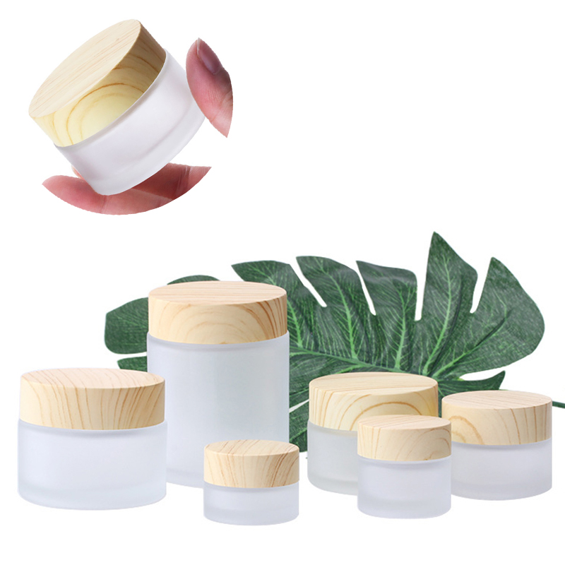 Frosted Glass Jar Cream Bottles Round Cosmetic Jars Hand Face Packing Bottles 5g 50g Jars With Wood Grain Cover s
Frosted Glass Jar Cream Bottles Round Cosmetic Jars Hand Face Packing Bottles 5g 50g Jars With Wood Grain Cover s