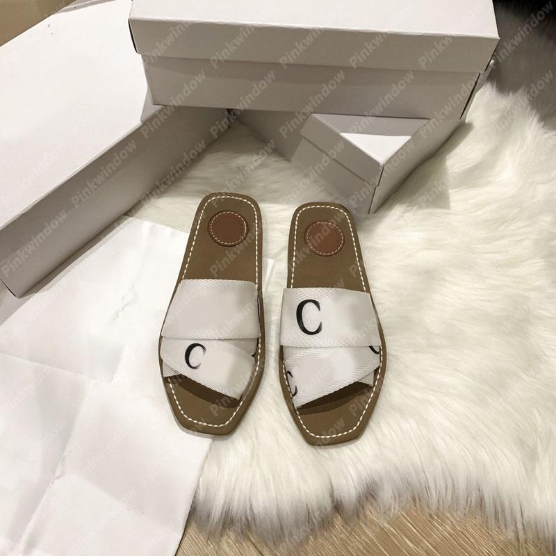 Women Slides Flat Sandals Woody Mule In Canvas Espadrille Luxurys Designers Sliders Sandalias Sandale Designer Shoes Slide Sandales 2104061L, Black
Women Slides Flat Sandals Woody Mule In Canvas Espadrille Luxurys Designers Sliders Sandalias Sandale Designer Shoes Slide Sandales 2104061L, Black