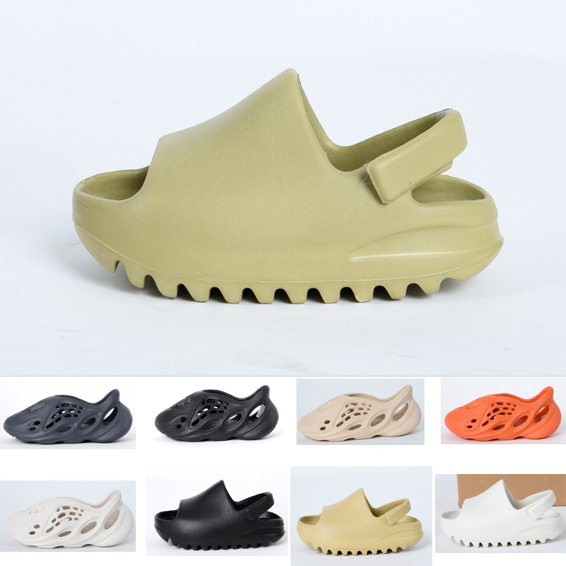 2021 fashion Summer sandal Children shoes boy girl youth kid Kanye west Slide Desert Sand Beach slipper foam runner Bone, Black;red
2021 fashion Summer sandal Children shoes boy girl youth kid Kanye west Slide Desert Sand Beach slipper foam runner Bone, Black;red