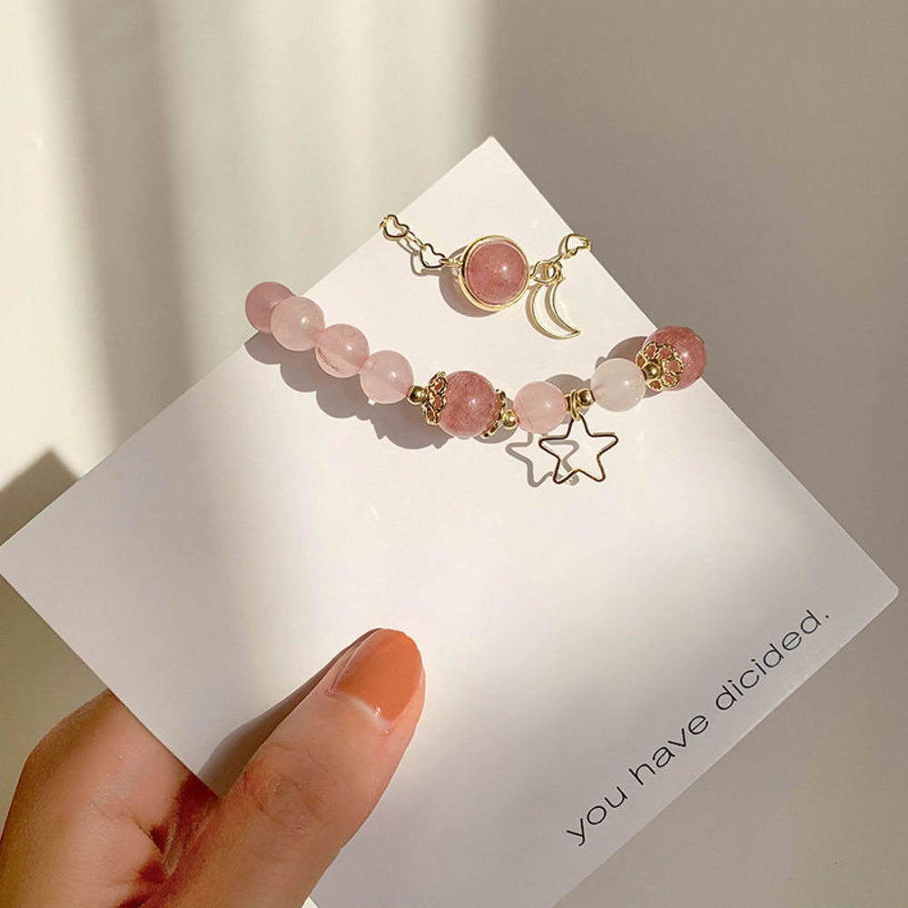 Natural strawberry powder crystal bracelet women's simple Korean personality student sweet wind girl heart recruit Peach Blossom Hand string, Golden;silver
Natural strawberry powder crystal bracelet women's simple Korean personality student sweet wind girl heart recruit Peach Blossom Hand string, Golden;silver