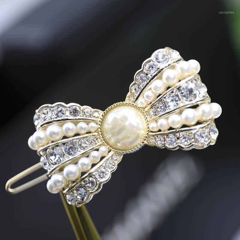 Hair Clips & Barrettes Pattern Sweet Temperament Golden Pearl Bow Hairpin Zircon Shiny Women's Accessories Delicate Fashion Jewelry Luxuriou
Hair Clips & Barrettes Pattern Sweet Temperament Golden Pearl Bow Hairpin Zircon Shiny Women's Accessories Delicate Fashion Jewelry Luxuriou