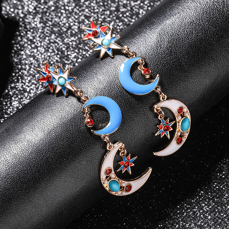 European And American Unique Star Moon Charm Retro Exaggerated Alloy Diamond Cross Pendant Earring Korean Asymmetric Earrings Wholesale
European And American Unique Star Moon Charm Retro Exaggerated Alloy Diamond Cross Pendant Earring Korean Asymmetric Earrings Wholesale