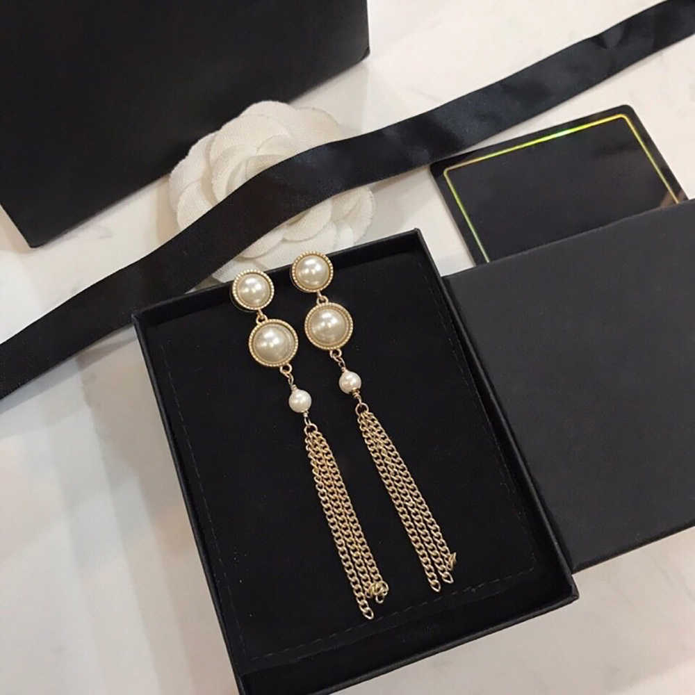 Hot Brand Yellow Gold Color Fashion Jewelery Woman Pearls Earrings Geisha Dream Party High Quality Tassel Chain Studing Jewelry
Hot Brand Yellow Gold Color Fashion Jewelery Woman Pearls Earrings Geisha Dream Party High Quality Tassel Chain Studing Jewelry