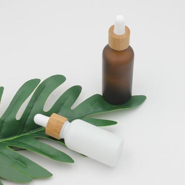 Frosted Matte Amber White Glass Dropper Bottle 15ml 30ml 50ml with Bamboo Cap 1oz Wooden Essential Oil Bottles
Frosted Matte Amber White Glass Dropper Bottle 15ml 30ml 50ml with Bamboo Cap 1oz Wooden Essential Oil Bottles