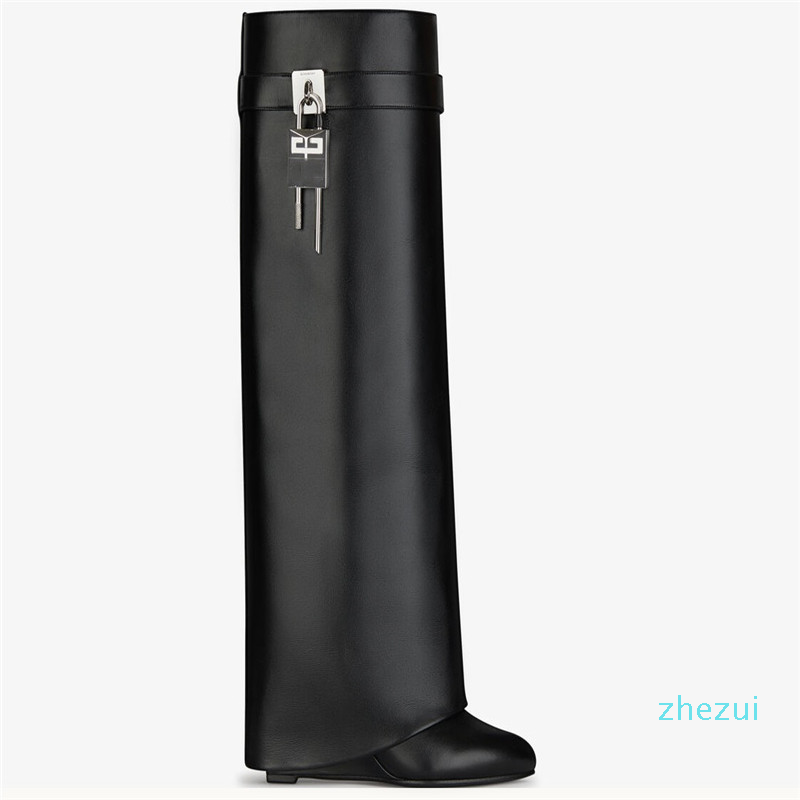 designer Knee boots leather silver and gold asymmetrical metal padlock clad wedge almond shaped toe heel height 9cm, Black
designer Knee boots leather silver and gold asymmetrical metal padlock clad wedge almond shaped toe heel height 9cm, Black