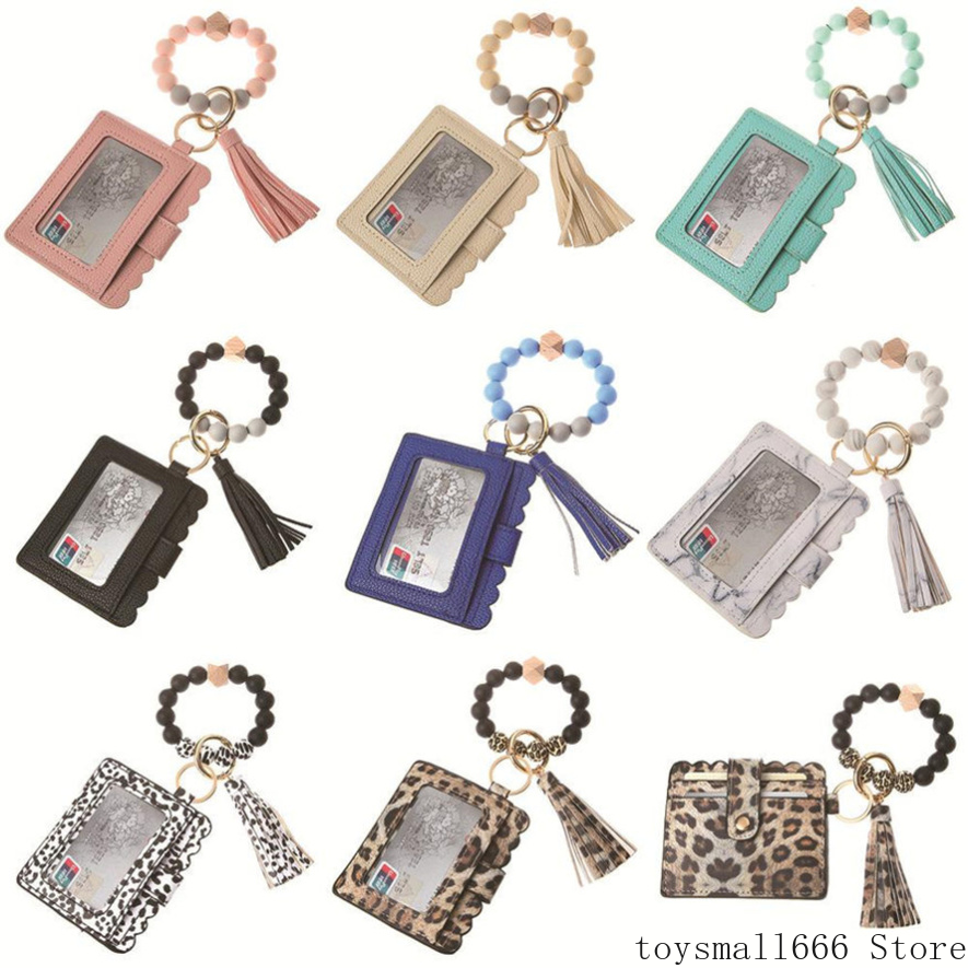 Fashion PU Leather Bracelet Wallet Keychain Party Favor Tassels Bangle Key Ring Holder Card Bag Silicone Beaded Wristlet Keychains Handbag Women Jewelry
Fashion PU Leather Bracelet Wallet Keychain Party Favor Tassels Bangle Key Ring Holder Card Bag Silicone Beaded Wristlet Keychains Handbag Women Jewelry