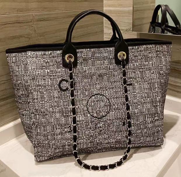 2021 European And American Style Travel Crossbody Bag Womens Luxury Designer Fashion Knitting Canvas Handbag Ladies Beach Casual Shopping Totes
2021 European And American Style Travel Crossbody Bag Womens Luxury Designer Fashion Knitting Canvas Handbag Ladies Beach Casual Shopping Totes