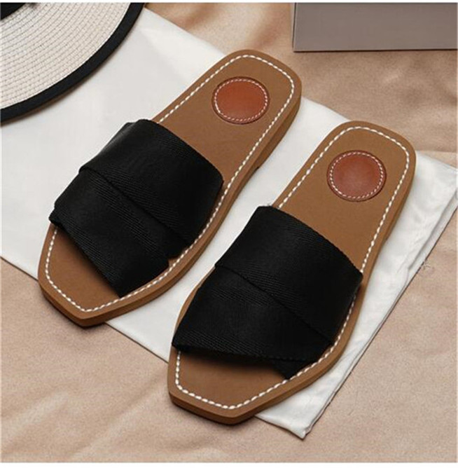 2022 Newest Brand Women Wooden Mules Flat Slippers Designer Ladies Lettering Fabric Outdoor Leather Sole Sandals With Box 35-41 Black, Cotton slippers
2022 Newest Brand Women Wooden Mules Flat Slippers Designer Ladies Lettering Fabric Outdoor Leather Sole Sandals With Box 35-41 Black, Cotton slippers