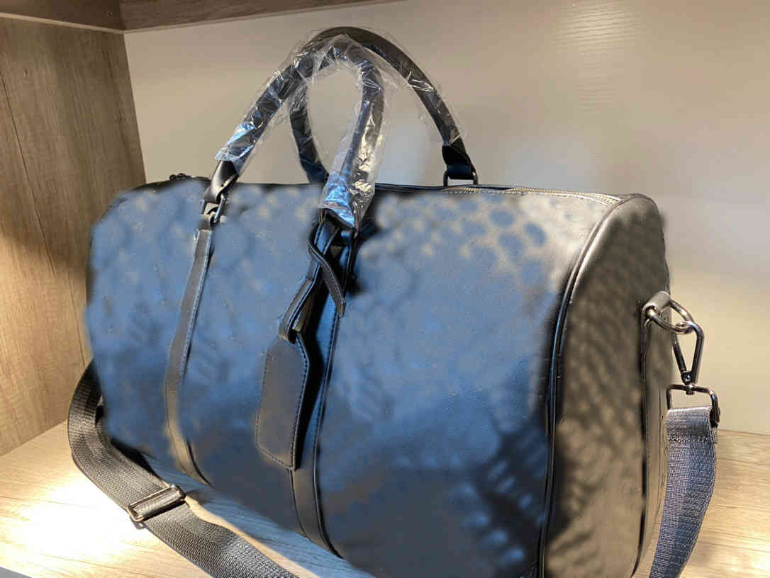 Bag men women high-quality travel duffle brand luggage handbags lock large capacity sport 8888
Bag men women high-quality travel duffle brand luggage handbags lock large capacity sport 8888
