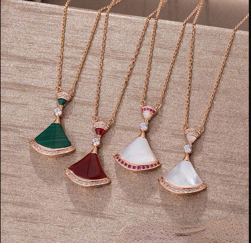 925 sterling Strings silver mother-of-pearl small skirt pendant ladies fashion fan-shaped necklace personalized luxury brand jewelry
925 sterling Strings silver mother-of-pearl small skirt pendant ladies fashion fan-shaped necklace personalized luxury brand jewelry