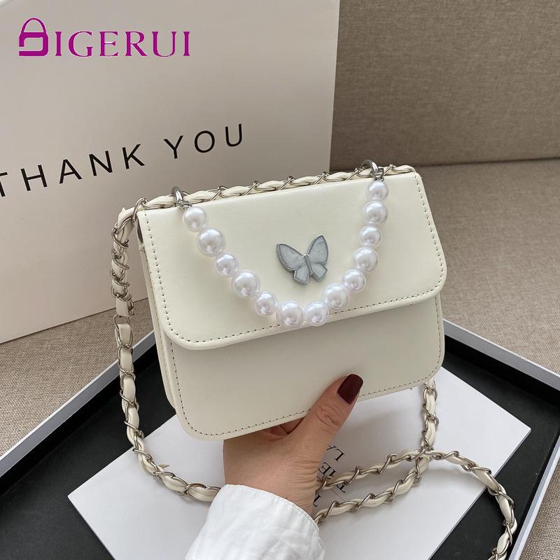 Fashion Solid Color PU Shoulder Bags Women Pearl Butterfly Handbags Totes Female Casual Travel Crossbody Sling Pouch
Fashion Solid Color PU Shoulder Bags Women Pearl Butterfly Handbags Totes Female Casual Travel Crossbody Sling Pouch