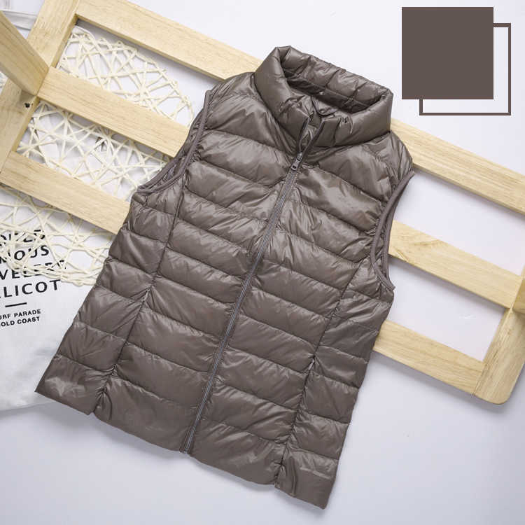 Women Ultra Light Down Vest Winter Warm Plus Size 4XL White duck down Jacket Female Vests Stand collar Sleeveless Waistcoat 211013