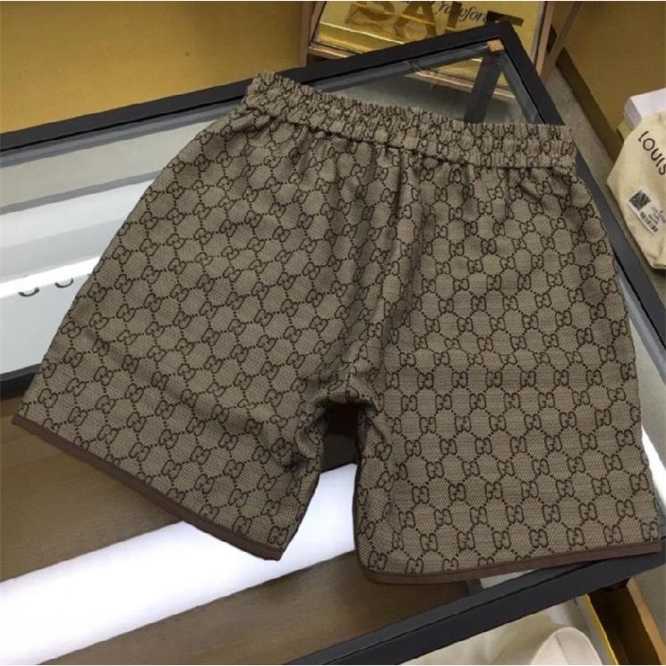 Original label embroidered print pants Fashion Mens Shorts Casual Solid Color Board Summer style Beach Swimming Men High quality Short, Brown 
Original label embroidered print pants Fashion Mens Shorts Casual Solid Color Board Summer style Beach Swimming Men High quality Short, Brown