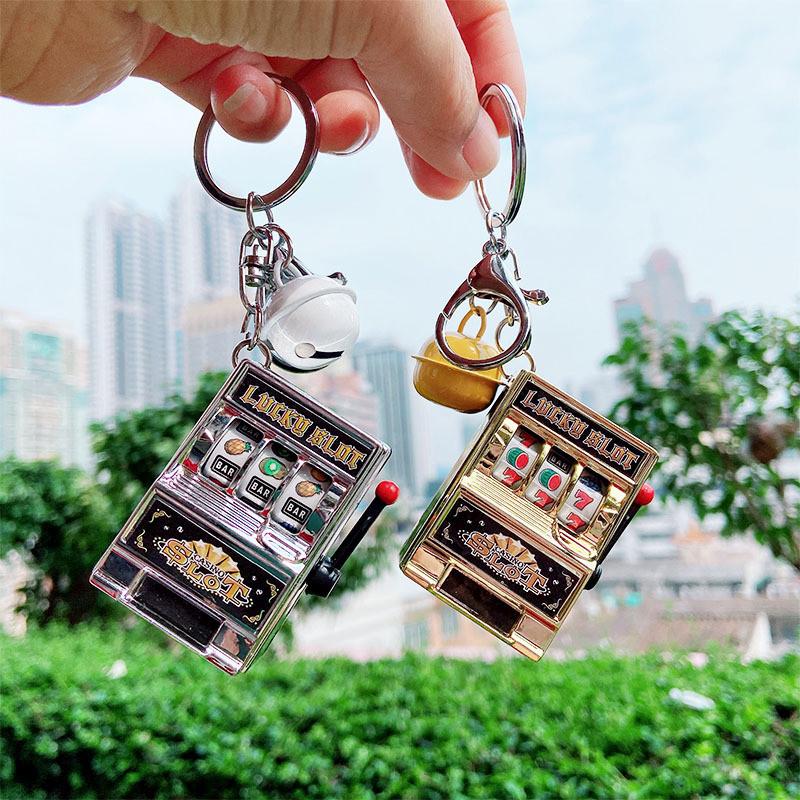 Keychains Creative Mini Slot Machine Bell Car Keyring Pressure Relief Palm Pouch Fruit Keychain Puzzle Doll Small Pendant
Keychains Creative Mini Slot Machine Bell Car Keyring Pressure Relief Palm Pouch Fruit Keychain Puzzle Doll Small Pendant