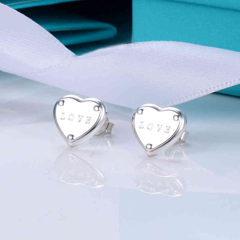 New women's heart TIF silver love earrings Heart double sided steel print earrings G1129
New women's heart TIF silver love earrings Heart double sided steel print earrings G1129