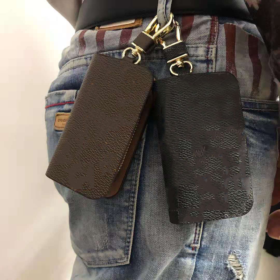 Luxurys Designers Fashion Key Wallets Buckle Bag Car Keychain Handmade Leather high quality Keychains Man Woman Monograms Purse Bags Pendant Accessories 29A95, Brown plaid
Luxurys Designers Fashion Key Wallets Buckle Bag Car Keychain Handmade Leather high quality Keychains Man Woman Monograms Purse Bags Pendant Accessories 29A95, Brown plaid