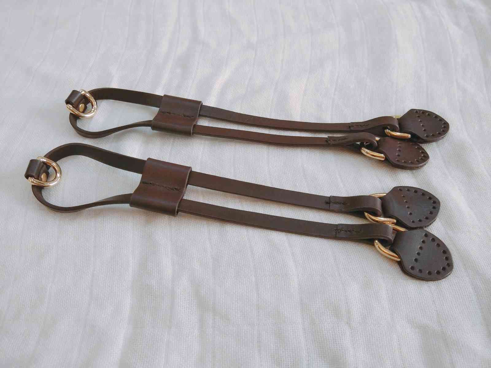 A pair of cinch drawstrings for luxury handbag ,real vachetta leather strap and slider
A pair of cinch drawstrings for luxury handbag ,real vachetta leather strap and slider