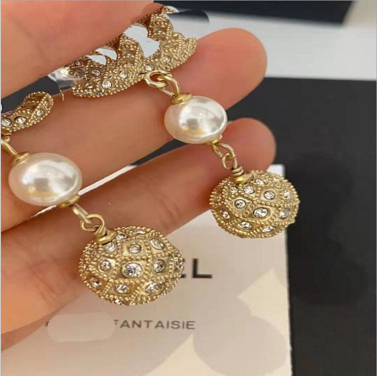 2021 fragrance long retro earrings rhinestone pearl xiangjia earrings fashion temperament earrings 925 silver needle
2021 fragrance long retro earrings rhinestone pearl xiangjia earrings fashion temperament earrings 925 silver needle