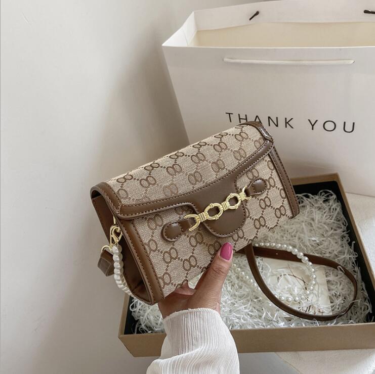 Factory wholesale women bags small fresh Pearl shoulder messenger bag sweet and lovely polka dot printing storage wallet personalized embroidery handbag
Factory wholesale women bags small fresh Pearl shoulder messenger bag sweet and lovely polka dot printing storage wallet personalized embroidery handbag
