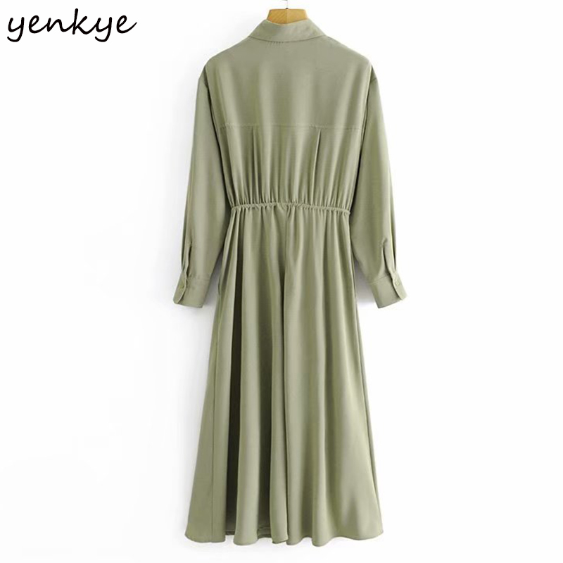 YENKYE Vintage Solid Color Long Maxi Dress Women Front Knot Long Sleeve Lapel Collar A-line Casual Winter Dress Plus Size Robe 210515