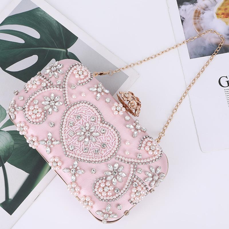 European And American Style Pearl Dinner Bag Handbag Exquisite Elegant Temperament Diamond Storage Bride Evening Bags
European And American Style Pearl Dinner Bag Handbag Exquisite Elegant Temperament Diamond Storage Bride Evening Bags