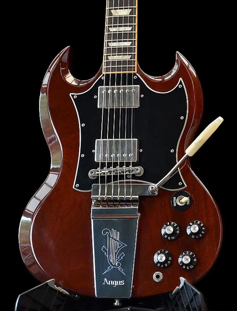 Promotion! Angus Young Wine Cherry Red SG Electric Guitar Engraved Lyre Vibrola Maestro Tremolo Long Tailpiece, Pearl trapezoid Inlay, Tuilp Tuenrs 
Promotion! Angus Young Wine Cherry Red SG Electric Guitar Engraved Lyre Vibrola Maestro Tremolo Long Tailpiece, Pearl trapezoid Inlay, Tuilp Tuenrs