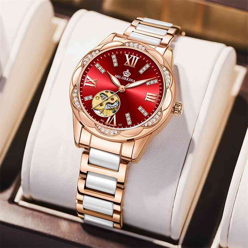 Ladies Watch Rose Gold Diamond Hollow Automatic Mechanical Wristwatches Women Luxury Top Brand Ceramic Strap Female Clock Aa 210707, Rose red
Ladies Watch Rose Gold Diamond Hollow Automatic Mechanical Wristwatches Women Luxury Top Brand Ceramic Strap Female Clock Aa 210707, Rose red